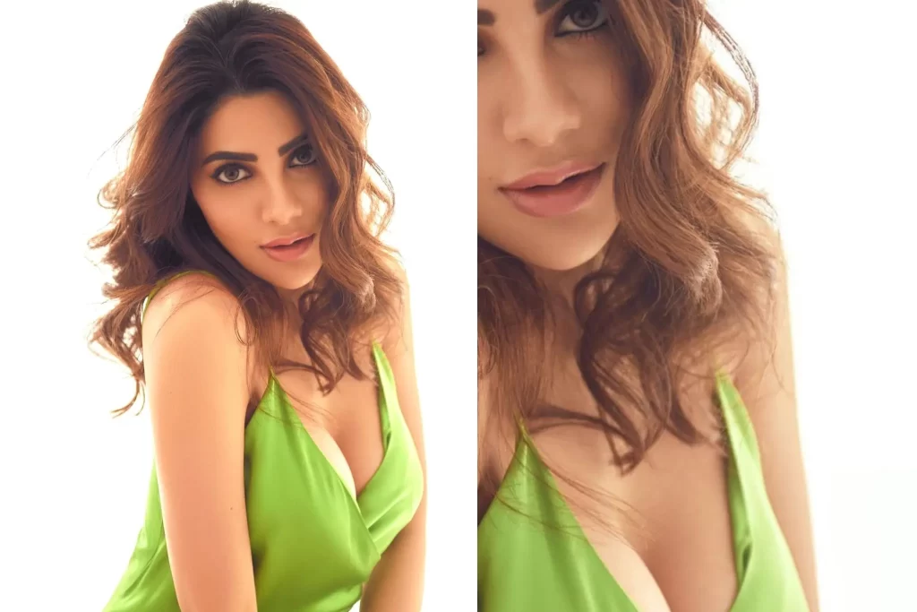 Nikki Tamboli sexy in green stain dress